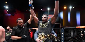 Francis Ngannou of Cameroon reacts after his victory over Stipe Miocic in their UFC heavyweight championship fight at UFC 260 at the Apex on March 27, 2021 in Las Vegas. Credit: Zuffa LLC/Jeff Bottari